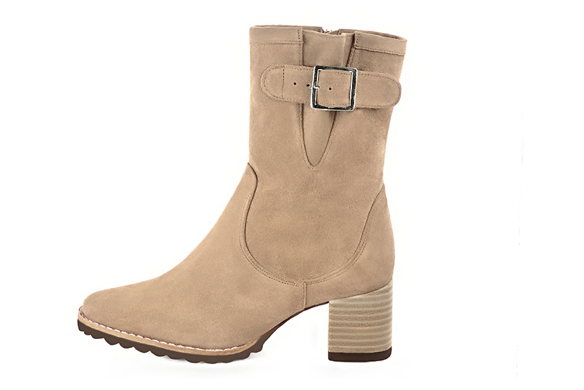 Tan beige women's ankle boots with buckles on the sides. Round toe. Medium block heels. Profile view - Florence KOOIJMAN
